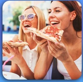 Two friends eating pizza &mdash; the Boat Deal